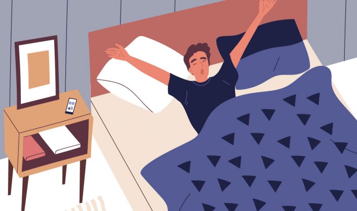 Mann liegt im Bett