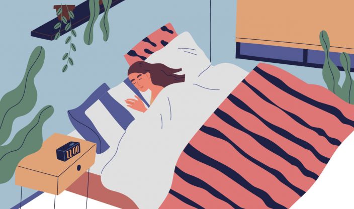 Frau schläft im Bett