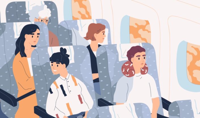 Menschen sitzen in einem Flugzeug
